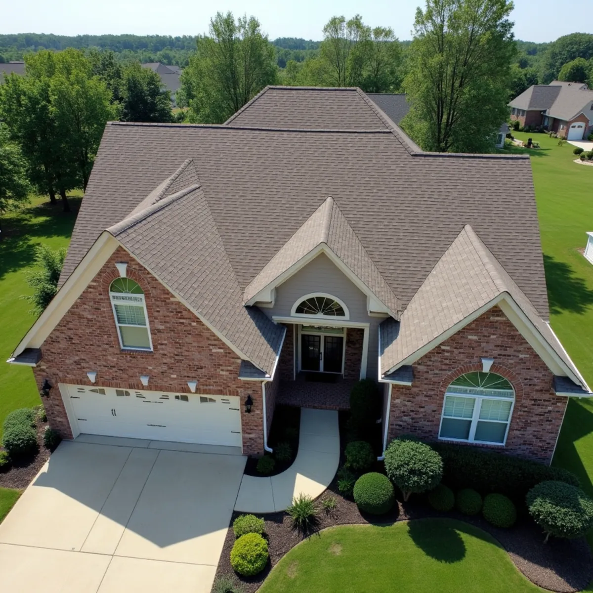 Completed residential shingle roofing installation by Ernest Roofing in Perry County, Arkansas