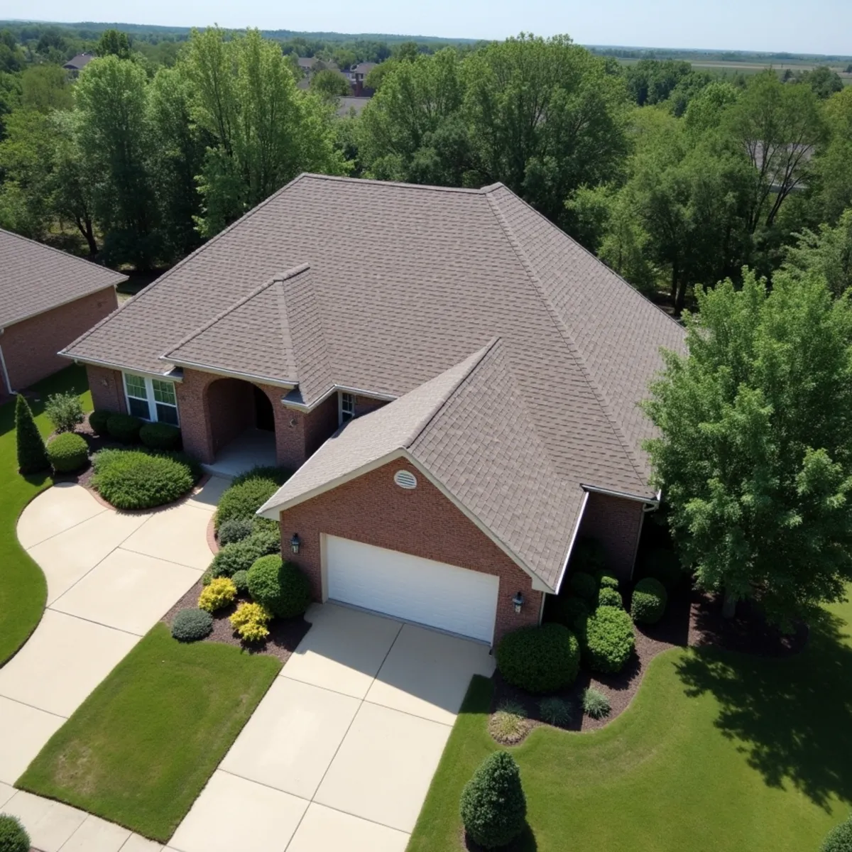 Completed residential shingle roofing installation by Ernest Roofing in Shannon Hills, Arkansas