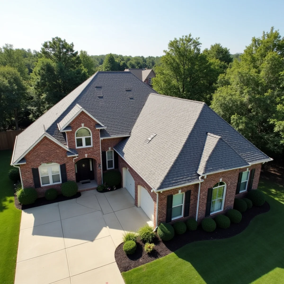 Completed residential shingle roofing installation by Ernest Roofing in Sherwood, Arkansas